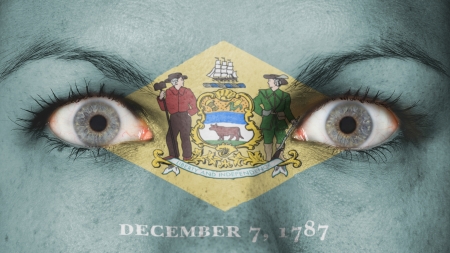 Close up of eyes. Painted face with flag of Delawareの写真素材