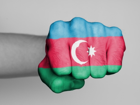 Fist of a man punching, flag of Azerbaijanの写真素材