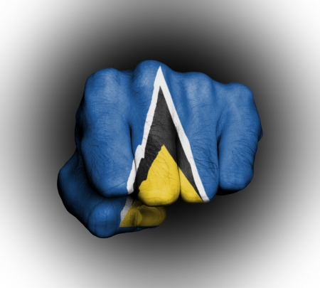 Fist of a man punching, flag of Saint Luciaの写真素材