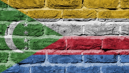 Very old brick wall texture, flag of the Comorosの写真素材