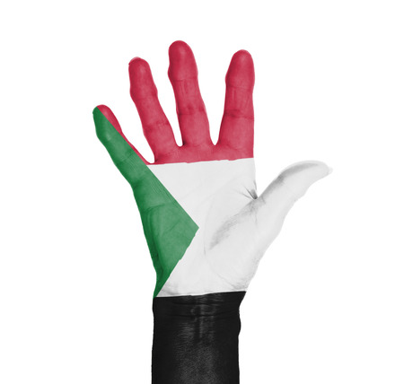 Palm of a woman hand, painted with flag of Sudanの写真素材