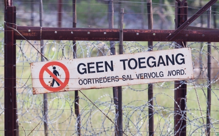 No access sign at a metal gate at Etosha National Park, Namibiaの写真素材