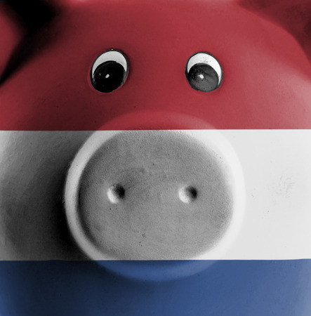 Ceramic piggy bank with painting of national flag, the Netherlandsの写真素材