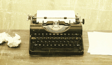 Close-up of an old typewriter with paper, vintage look