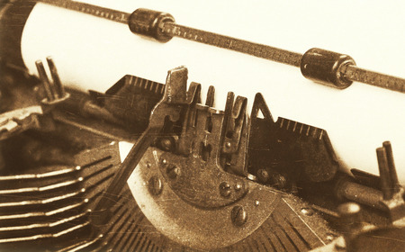 Close-up of an old typewriter with paper, vintage look