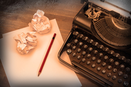 Close-up of an old typewriter with paper, vintage look, warmの写真素材