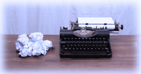 Vintage typewriter on wooden table, touch-up in retro style