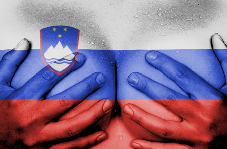 Upper part of female body, hands covering breasts, Sloveniaの写真素材
