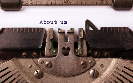 Vintage inscription made by old typewriter, about usの写真素材