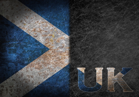 Old rusty metal sign with a flag and country abbreviation - Scotlandの写真素材