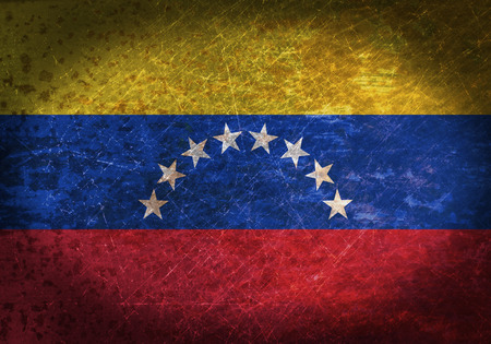 Old rusty metal sign with a flag - Venezuelaの写真素材