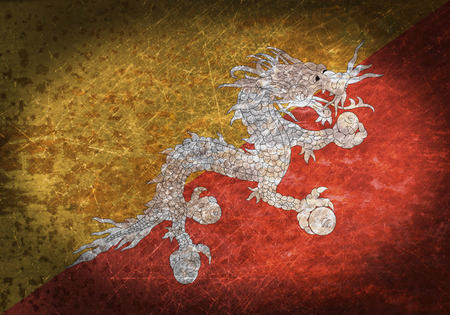 Old rusty metal sign with a flag - Bhutanの写真素材