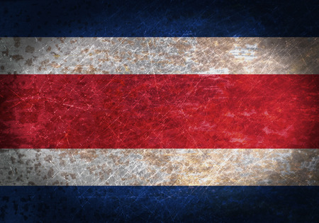 Old rusty metal sign with a flag - Costa Ricaの写真素材