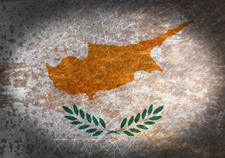 Old rusty metal sign with a flag - Cyprusの写真素材