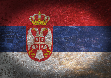 Old rusty metal sign with a flag - Serbiaの写真素材