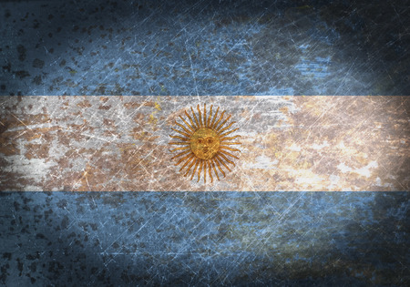 Old rusty metal sign with a flag - Argentinaの写真素材