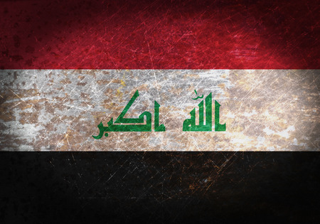Old rusty metal sign with a flag - Iraqの写真素材