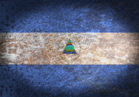 Old rusty metal sign with a flag - Nicaraguaの写真素材