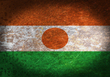 Old rusty metal sign with a flag - Nigerの写真素材