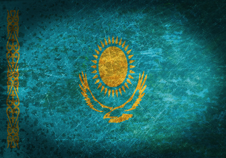 Old rusty metal sign with a flag - Kazakhstanの写真素材