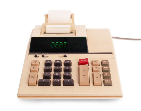 Old calculator showing a text on display - debitの写真素材
