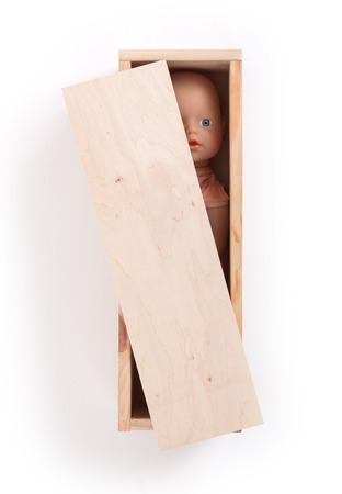Baby toy in wooden box, isolated on whiteの写真素材