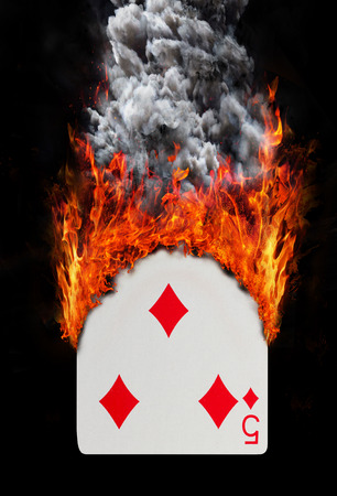 Playing card with fire and smoke - Five of diamondsの写真素材