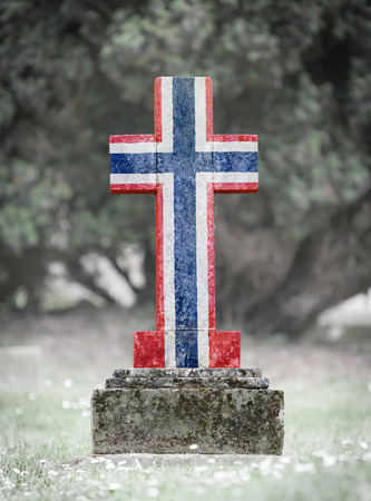 Old weathered gravestone in the cemetery - Norwayの写真素材