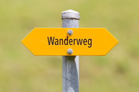 Bergwanderweg sign in the mountains, navigation for hikers, Switzerlandの写真素材