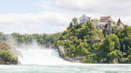 RHEINFALLS, SWITZERLAND - JULY 25, 2015: View to the biggest waterfalls of Europe in Schaffhausen, Switzerland on May 17, 2015. They are 150 m (450 ft) wide and 23 m (75 ft) high.のeditorial素材