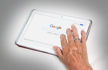 HEERENVEEN, NETHERLANDS - JUNE 6, 2015: Google is an American multinational corporation specializing in Internet-related services and products. Most of its profits are derived from AdWords.のeditorial素材