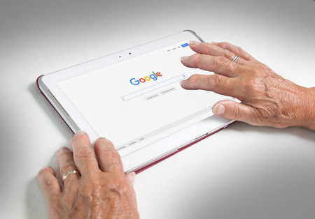 HEERENVEEN, NETHERLANDS - JUNE 6, 2015: Google is an American multinational corporation specializing in Internet-related services and products. Most of its profits are derived from AdWords.のeditorial素材