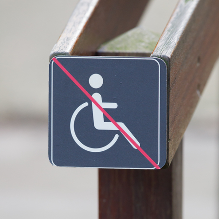 Disabled sign, handicapped person icon at a stairsの写真素材