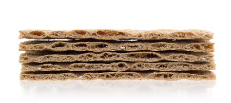 Stack of crackers (breakfast) isolated on a white backgroundの写真素材