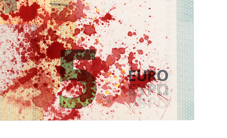Close-up of a 5 euro bank note, isolated, stained with bloodの写真素材