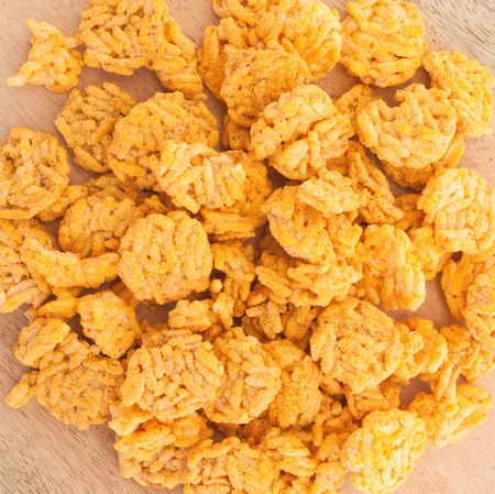 Spiced rice crispy isolated on white background
