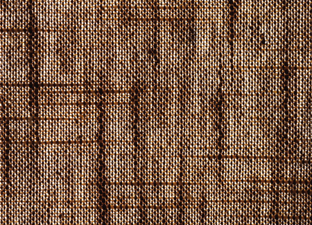 Close-up of a curtain, sunlight shining throughの写真素材