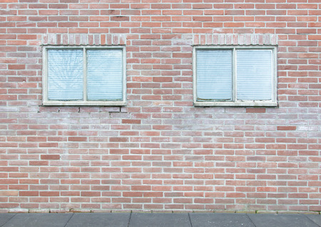 Background of an old vintage brick wall with windows