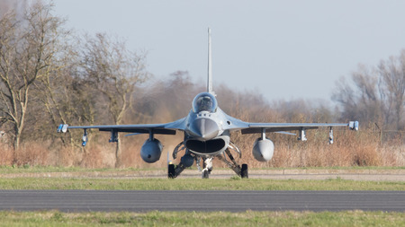 LEEUWARDEN, NETHERLANDS - APRIL 11, 2016: A dutch F-16 on the ground during the exercise Frisian Flag. The exercise is considered one of the most important NATO training events this year.のeditorial素材