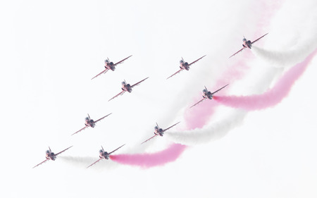 LEEUWARDEN, THE NETHERLANDS - JUNE 10, 2016: RAF Red Arrows performing at the Dutch Air Force Open House on June 10, 2016 at Leeuwarden Airfield, The Netherlands.のeditorial素材