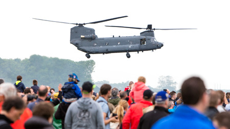 LEEUWARDEN, NETHERLANDS - JUNE 11 2016: Chinook CH-47 military helicopter in action during a demonstration flight on june 11 , 2016 in Leeuwardenのeditorial素材