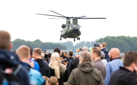 LEEUWARDEN, NETHERLANDS - JUNE 11 2016: Chinook CH-47 military helicopter in action during a demonstration flight on june 11 , 2016 in Leeuwardenのeditorial素材