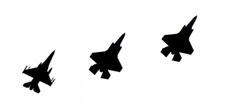 LEEUWARDEN, THE NETHERLANDS - JUNE 10, 2016: F-16 and 2 F-35 Lightning (silhouette) II flyby on it's...