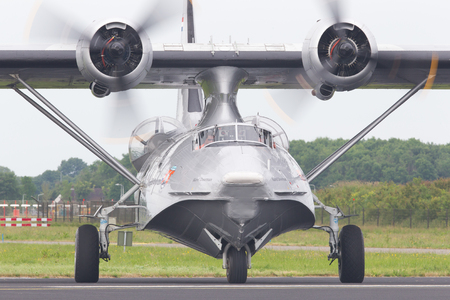 LEEUWARDEN, NETHERLANDS - JUNE 11: Consolidated PBY Catalina in Dutch Navy colors flying at the Royal Netherlands Air Force Days June 11, 2016 in Leeuwarden, Netherlands.のeditorial素材