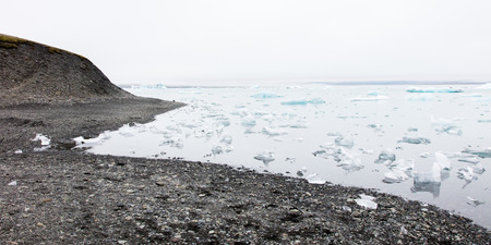 Jokulsarlon is a large glacial lake in southeast Iceland - Ice breaking of a glacierの写真素材