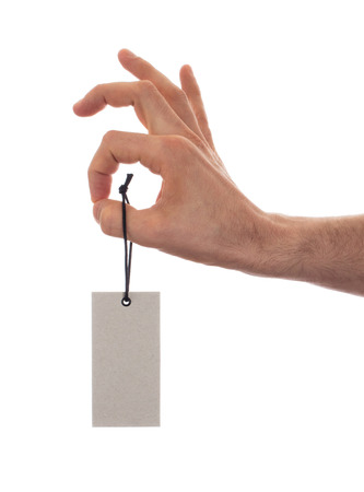 Blank tag tied with string, price tag, gift tag, sale tag, address label, isolated on whiteの写真素材