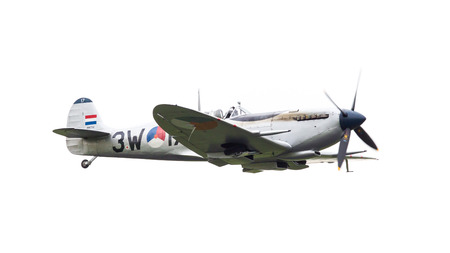 LEEUWARDEN, THE NETHERLANDS - JUNE 11, 2016: A vintage Spitfire fighter plane makes a low flypast...