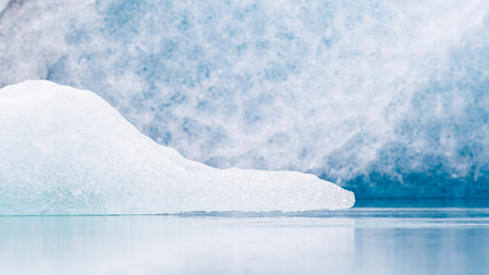 Jokulsarlon is a large glacial lake in southeast Iceland - Ice breaking of a glacierの写真素材
