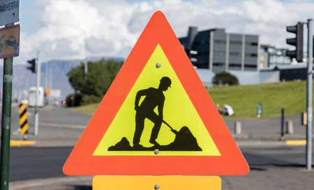 Roadworks sign, bright yellow and red - Iceland