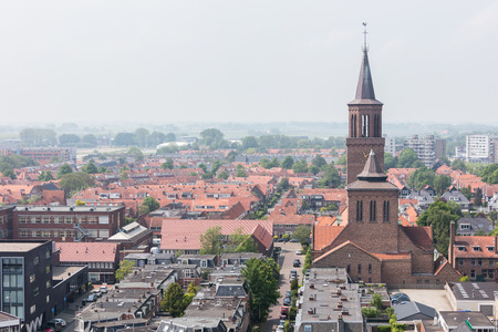 LEEUWARDEN, NETHERLANDS - MAY 28, 2016: View of a part of Leeuwarden with a big church on may 28, 2016.のeditorial素材